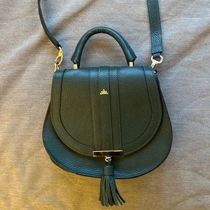 DeMellier London gently used forest green Mini Venice